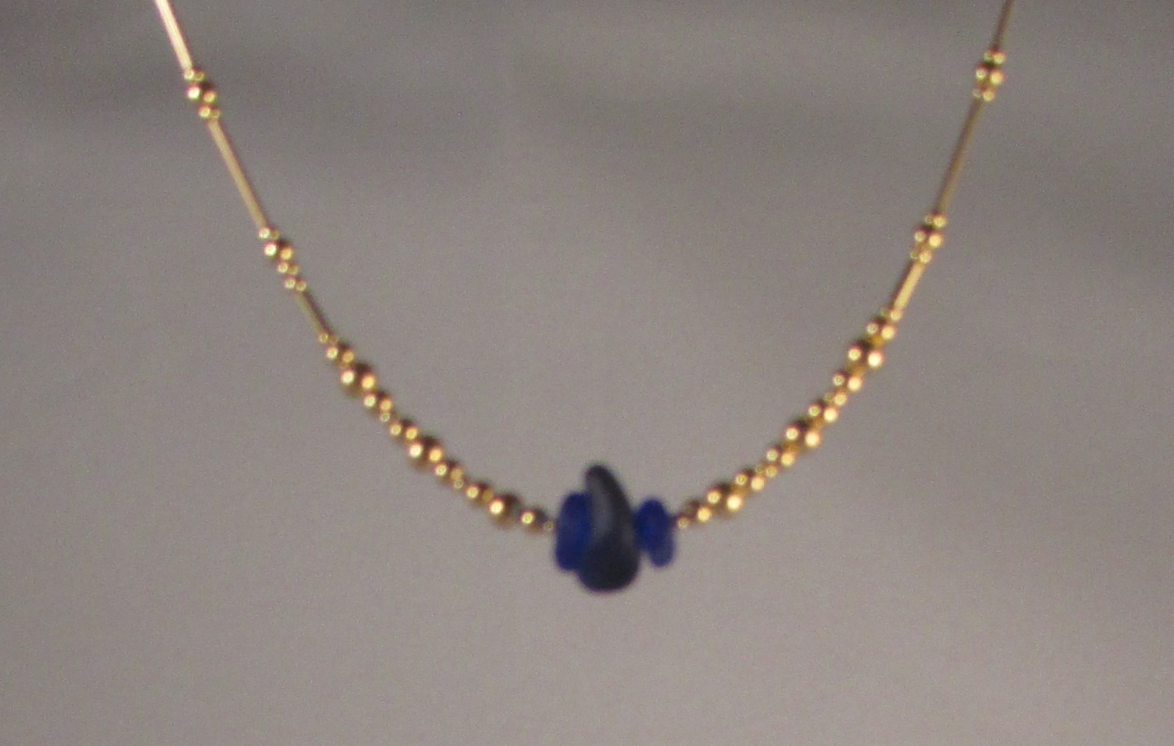 Center-drilled Spanish Cobalt Blue Glass on a Gold Fill Chain